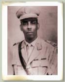 An old photo of a person
Description automatically generated