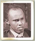 An old photo of a person
Description automatically generated